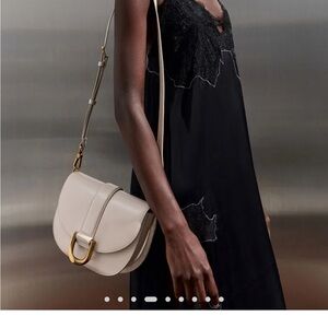 Charles & Keith Crossbody Bag in color oat.